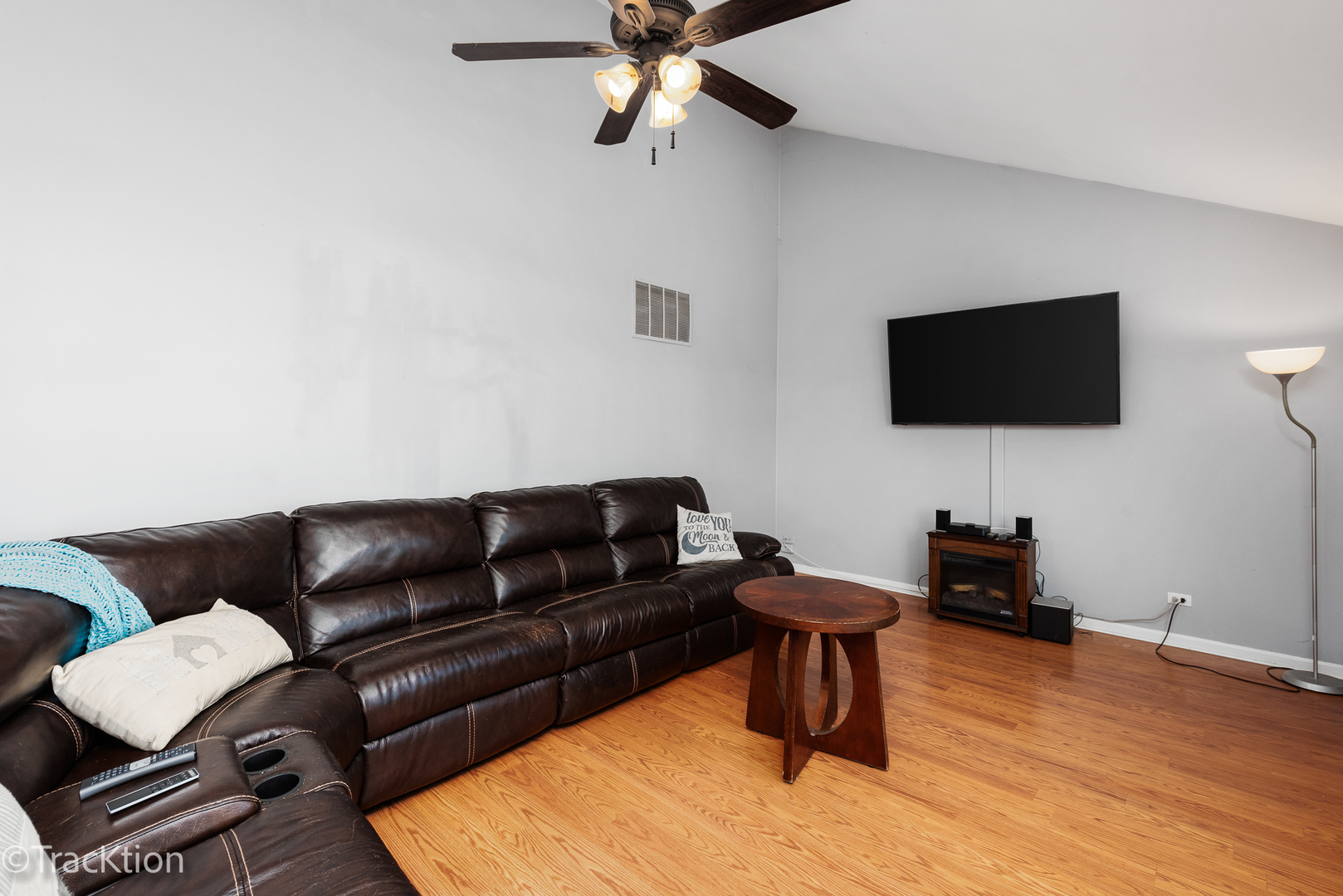 2008 Primrose Drive Plainfield, IL 60586 - Photo 11 of 26 a living room with furniture and a flat screen tv