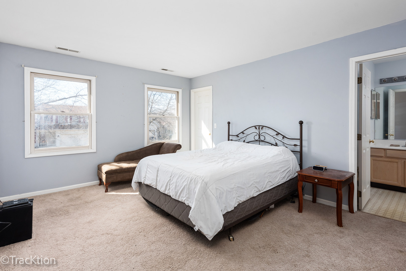 2008 Primrose Drive Plainfield, IL 60586 - Photo 14 of 26 a bedroom with a bed table and a window