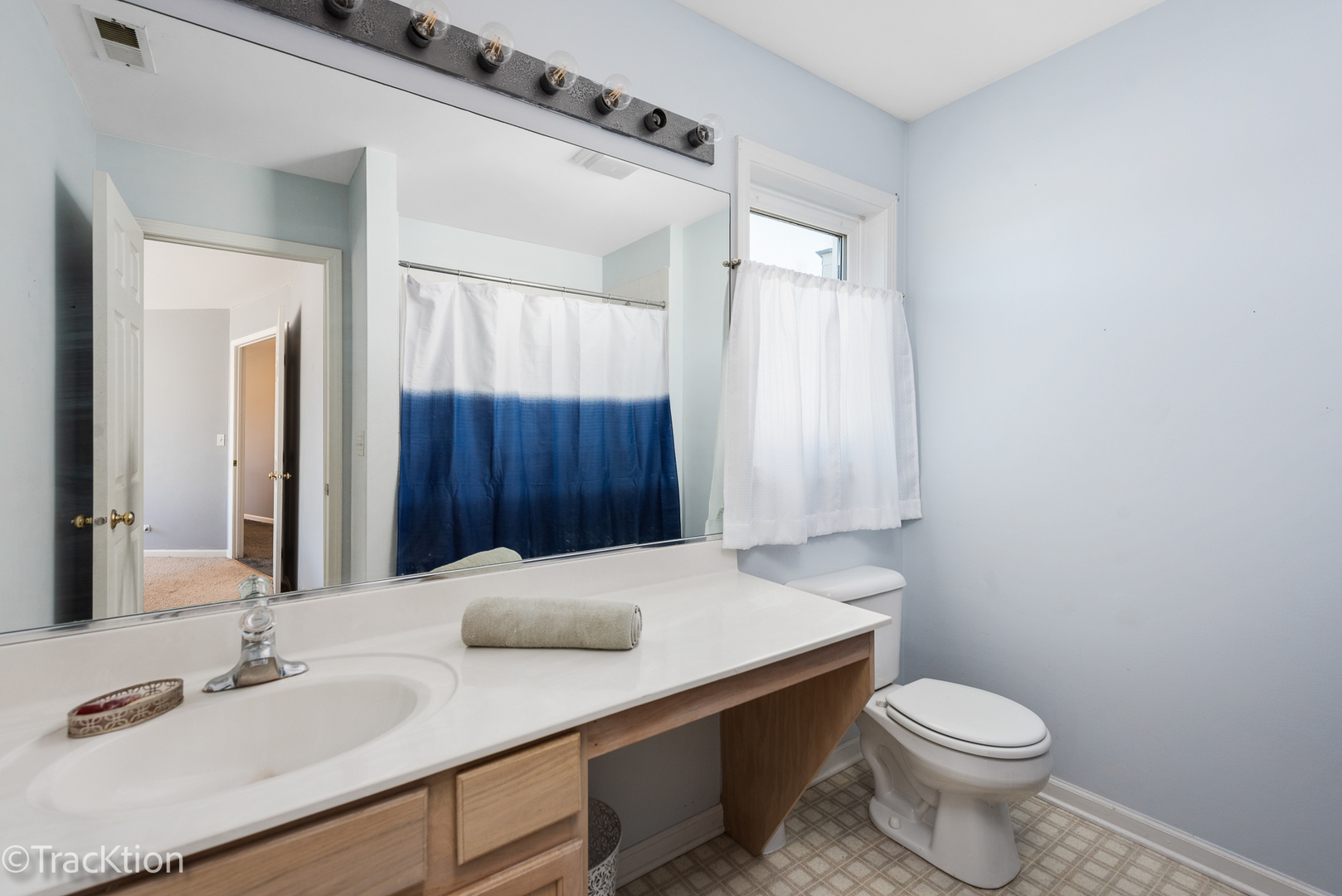2008 Primrose Drive Plainfield, IL 60586 - Photo 15 of 26 a bathroom with a sink a toilet and a mirror