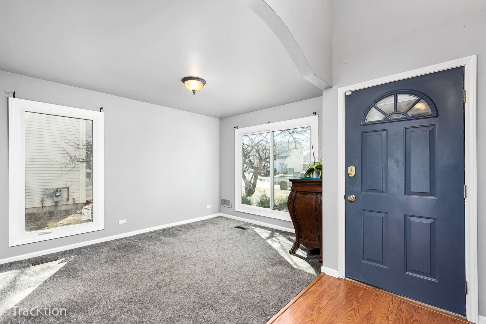 2008 Primrose Drive Plainfield, IL 60586 - Photo 3 of 26 a view of an entryway with wooden floor and a livingroom