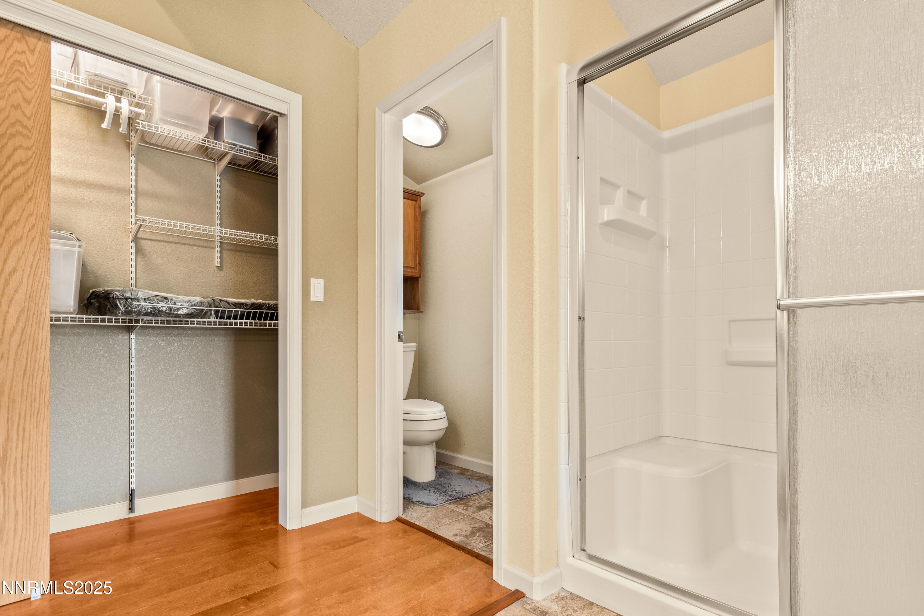 2140 Conestoga Road Reno, NV 89521 - Photo 13 of 35 a bathroom with a granite countertop shower and a toilet