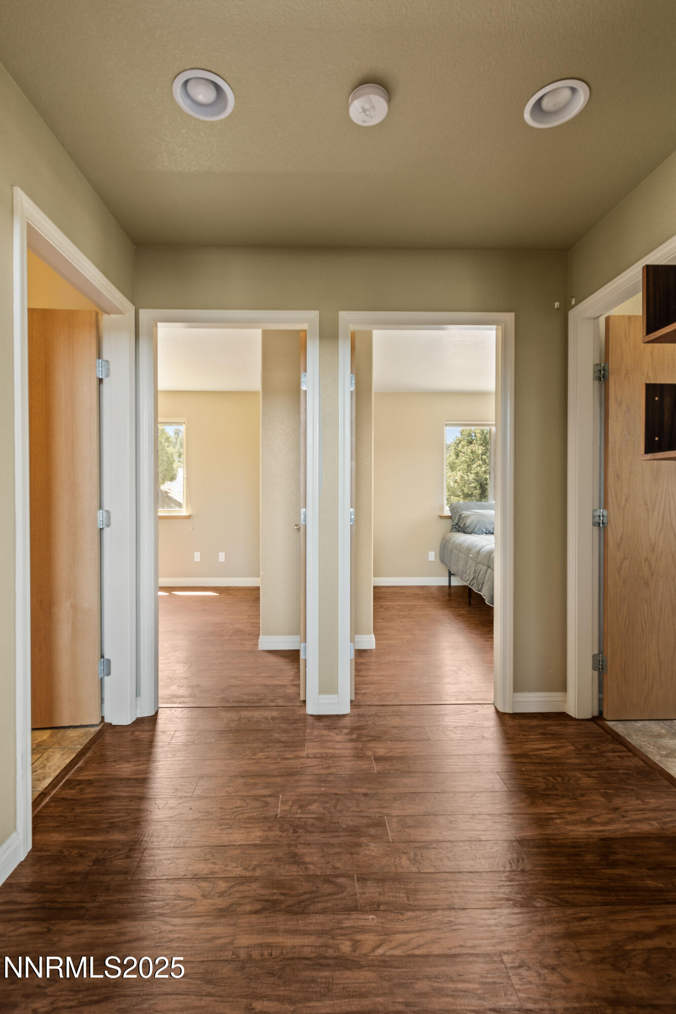 2140 Conestoga Road Reno, NV 89521 - Photo 15 of 35 wooden floor in an empty room and a window