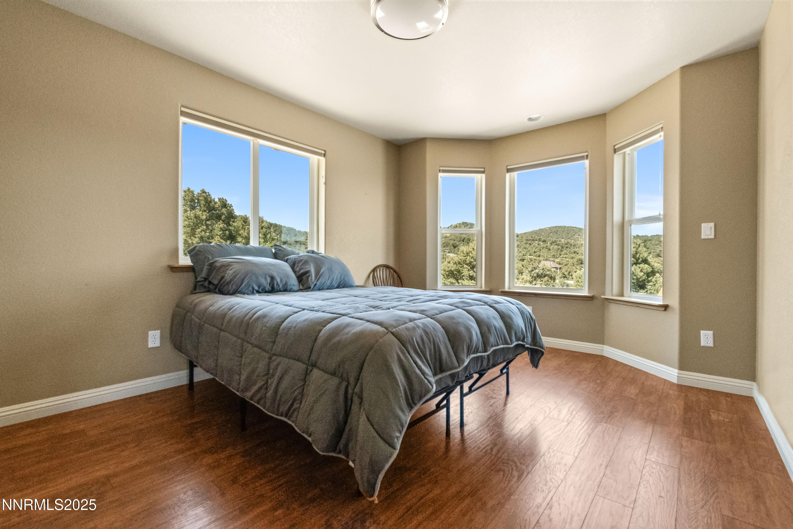 2140 Conestoga Road Reno, NV 89521 - Photo 20 of 35 a bedroom with a bed and a large window
