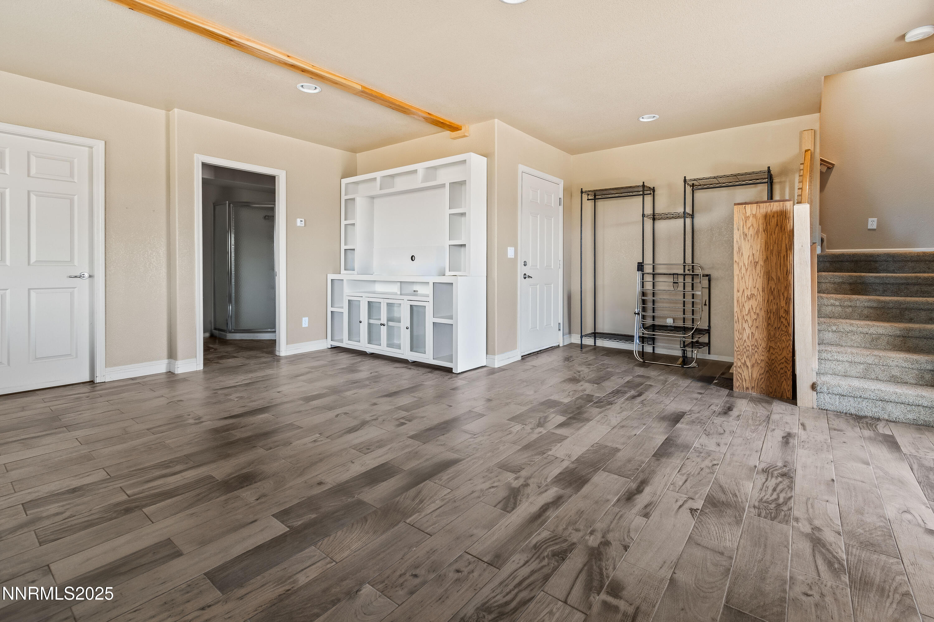2140 Conestoga Road Reno, NV 89521 - Photo 26 of 35 a view of empty room with wooden floor