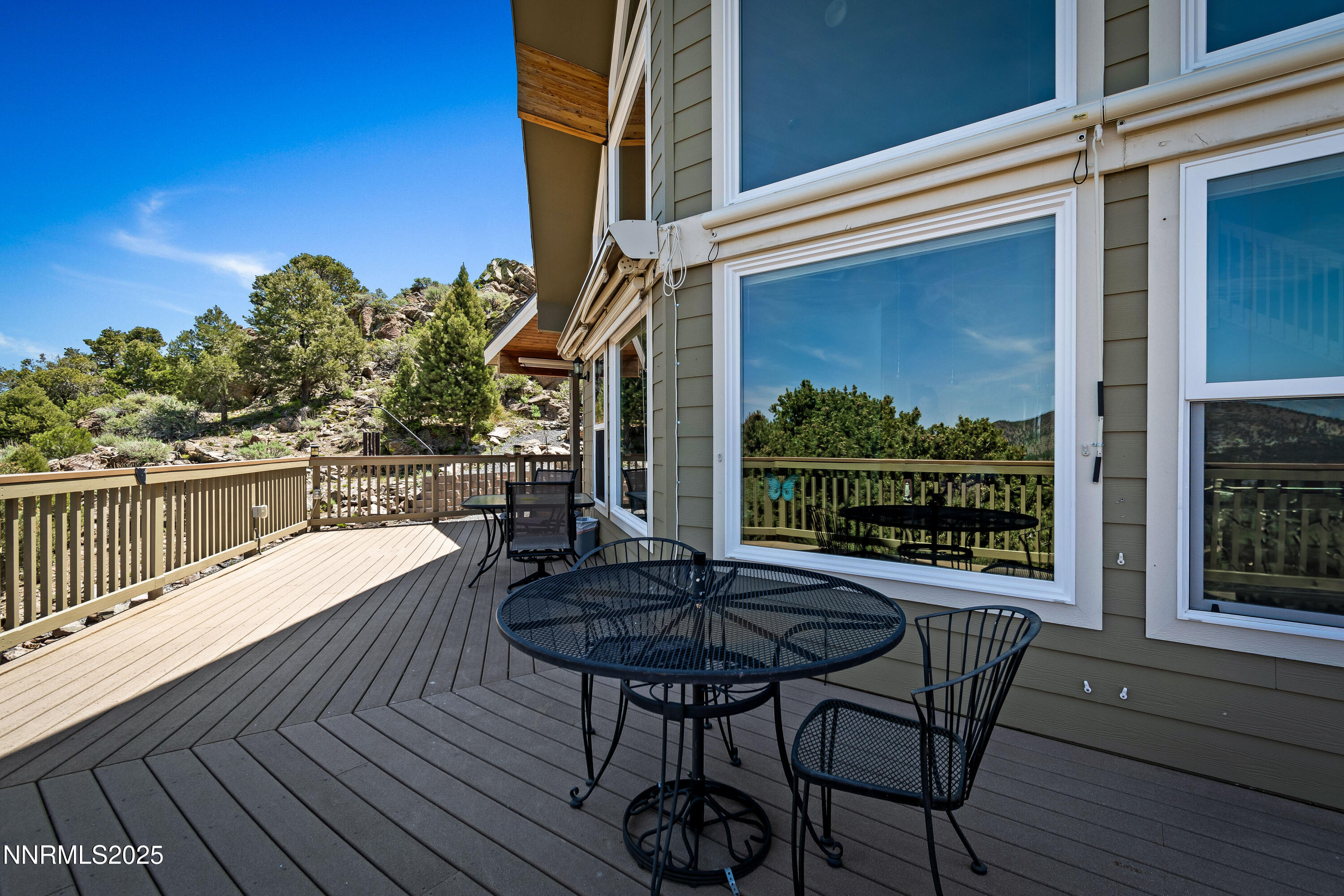 2140 Conestoga Road Reno, NV 89521 - Photo 32 of 35 a view of a chairs and table on the wooden floor