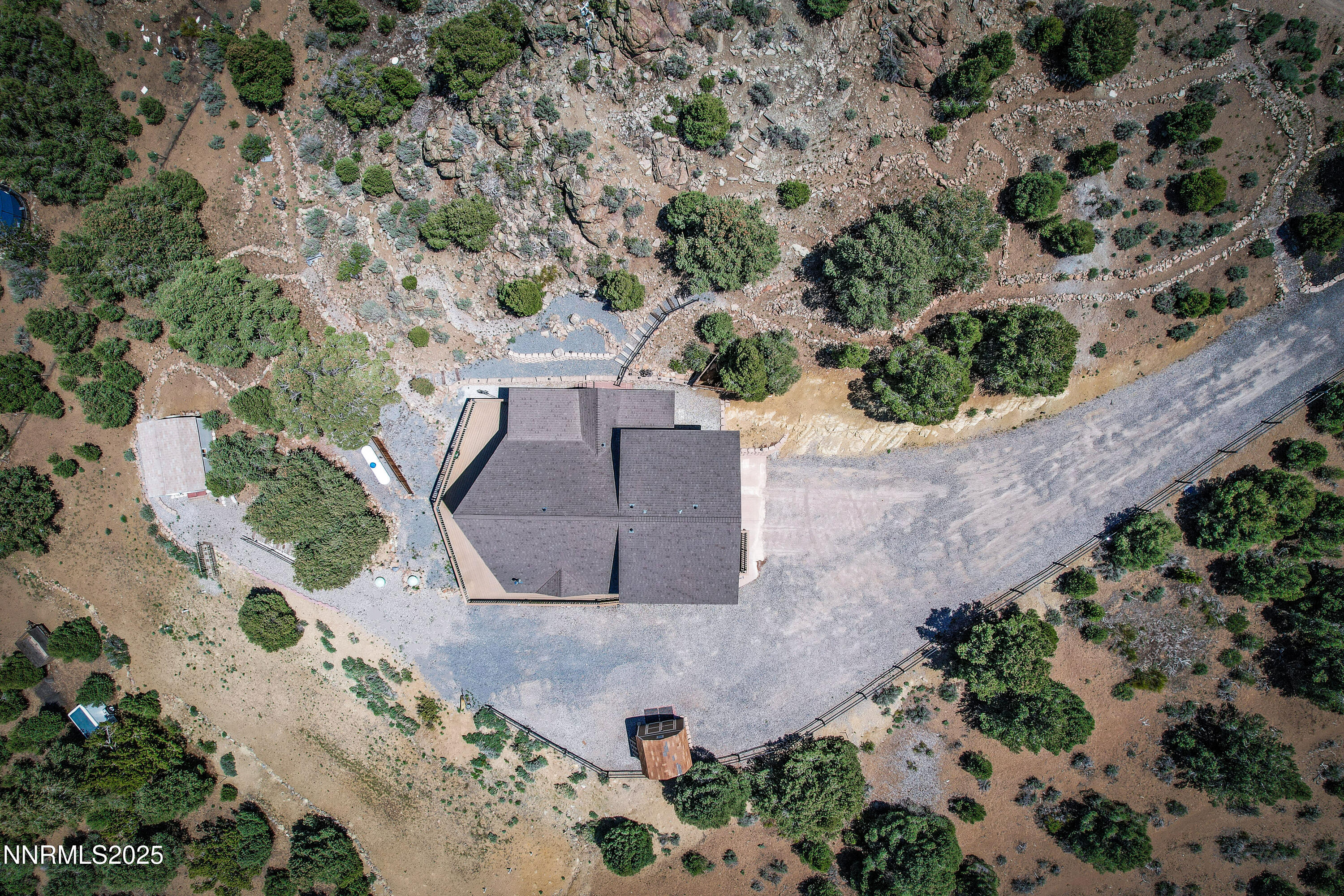 2140 Conestoga Road Reno, NV 89521 - Photo 33 of 35 an aerial view of a house with a yard and plants