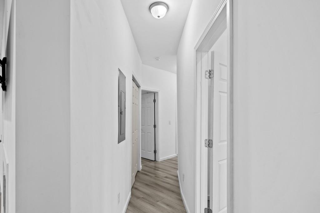 657 Summit Lane Ellijay, GA 30540 - Photo 14 of 33 a view of a hallway with wooden floor and entryway