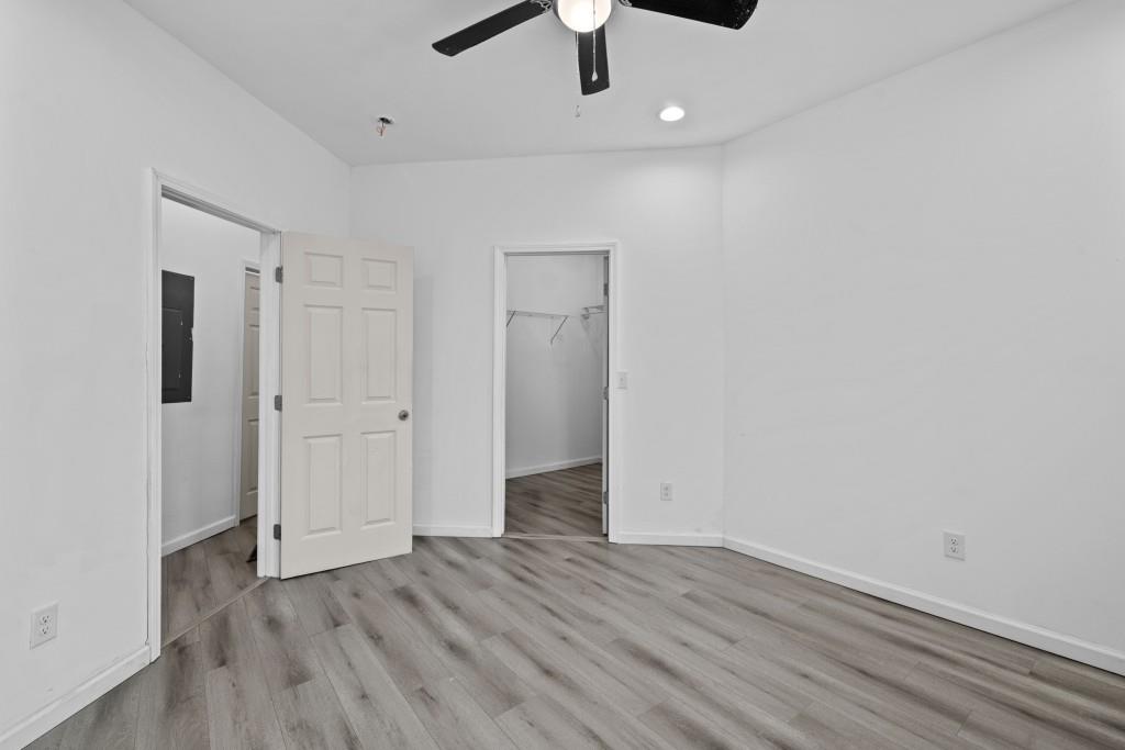 657 Summit Lane Ellijay, GA 30540 - Photo 16 of 33 wooden floor in an empty room with a window