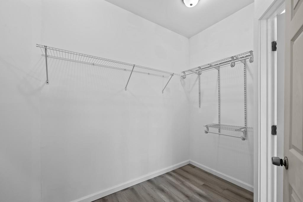 657 Summit Lane Ellijay, GA 30540 - Photo 18 of 33 a view of a room with wooden floor and closet