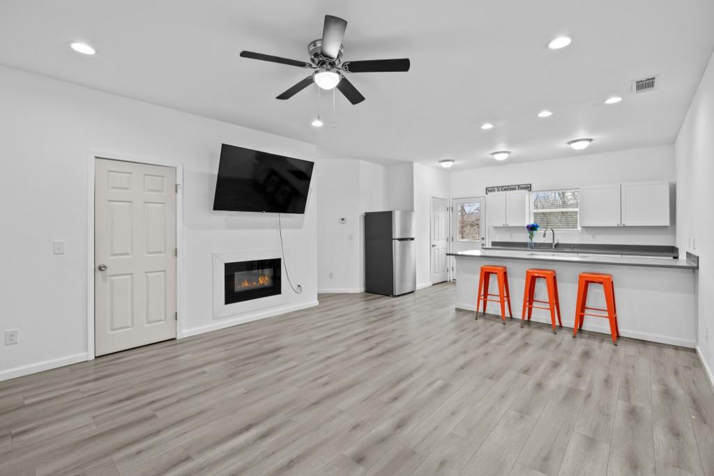 657 Summit Lane Ellijay, GA 30540 - Photo 6 of 33 a view of kitchen with microwave a stove and a refrigerator
