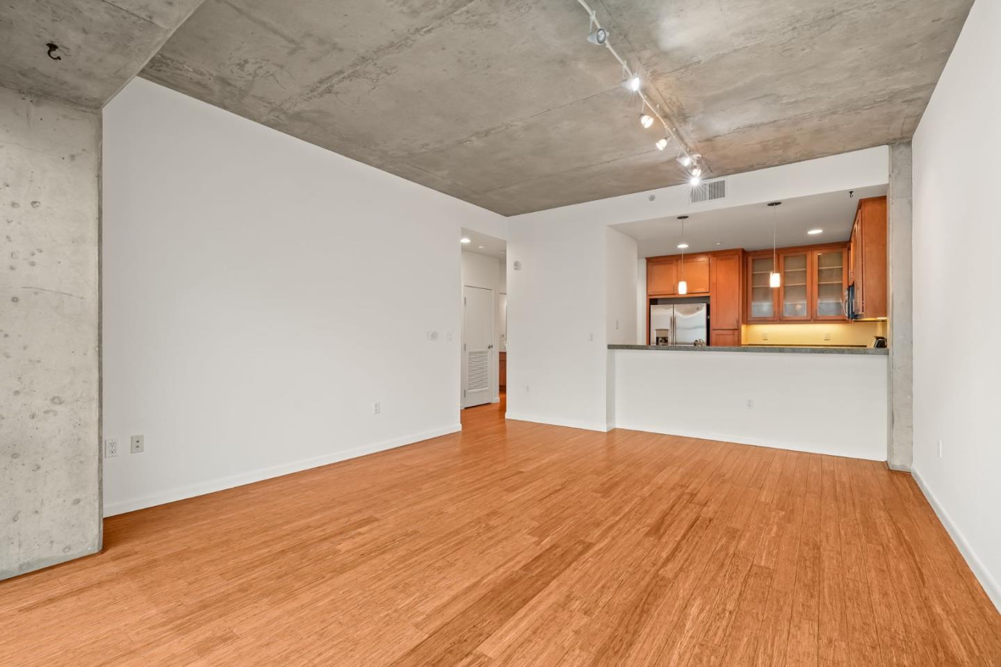 428 Alice Street, Unit 637 Oakland, CA 94607 - Photo 11 of 23 a view of empty room with wooden floor