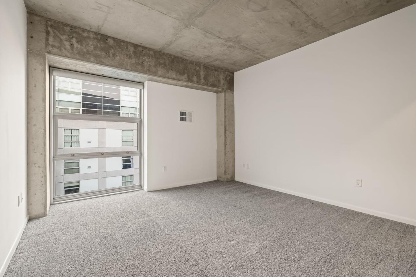 428 Alice Street, Unit 637 Oakland, CA 94607 - Photo 12 of 23 a view of an empty room and a window