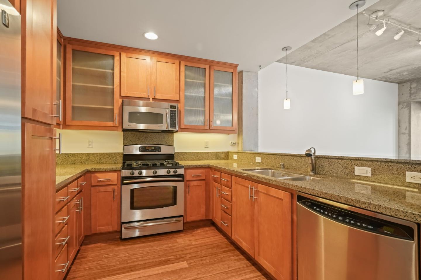 428 Alice Street, Unit 637 Oakland, CA 94607 - Photo 3 of 23 a kitchen with a stove and a sink