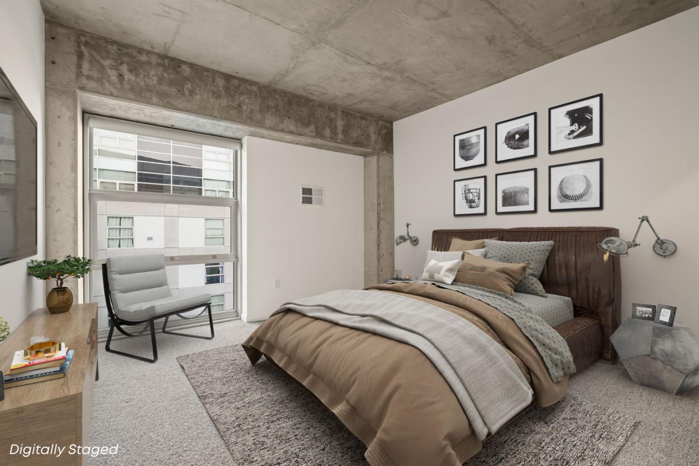 428 Alice Street, Unit 637 Oakland, CA 94607 - Photo 5 of 23 a bedroom with a bed and couch