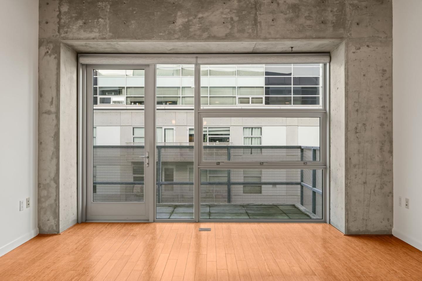428 Alice Street, Unit 637 Oakland, CA 94607 - Photo 10 of 23 a view of wooden floor and a window