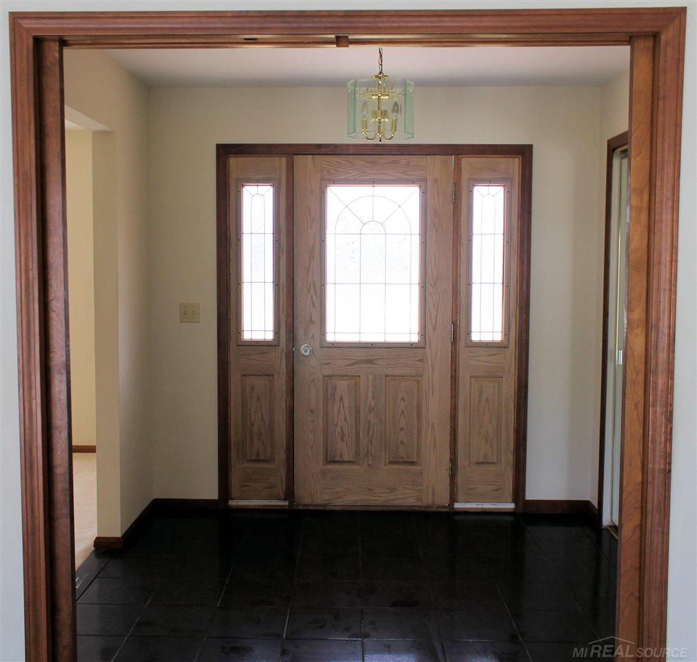 8586 Smiths Creek Road Goodells, MI 48027 - Photo 8 of 41 Front entrance with beautiful black tile floor