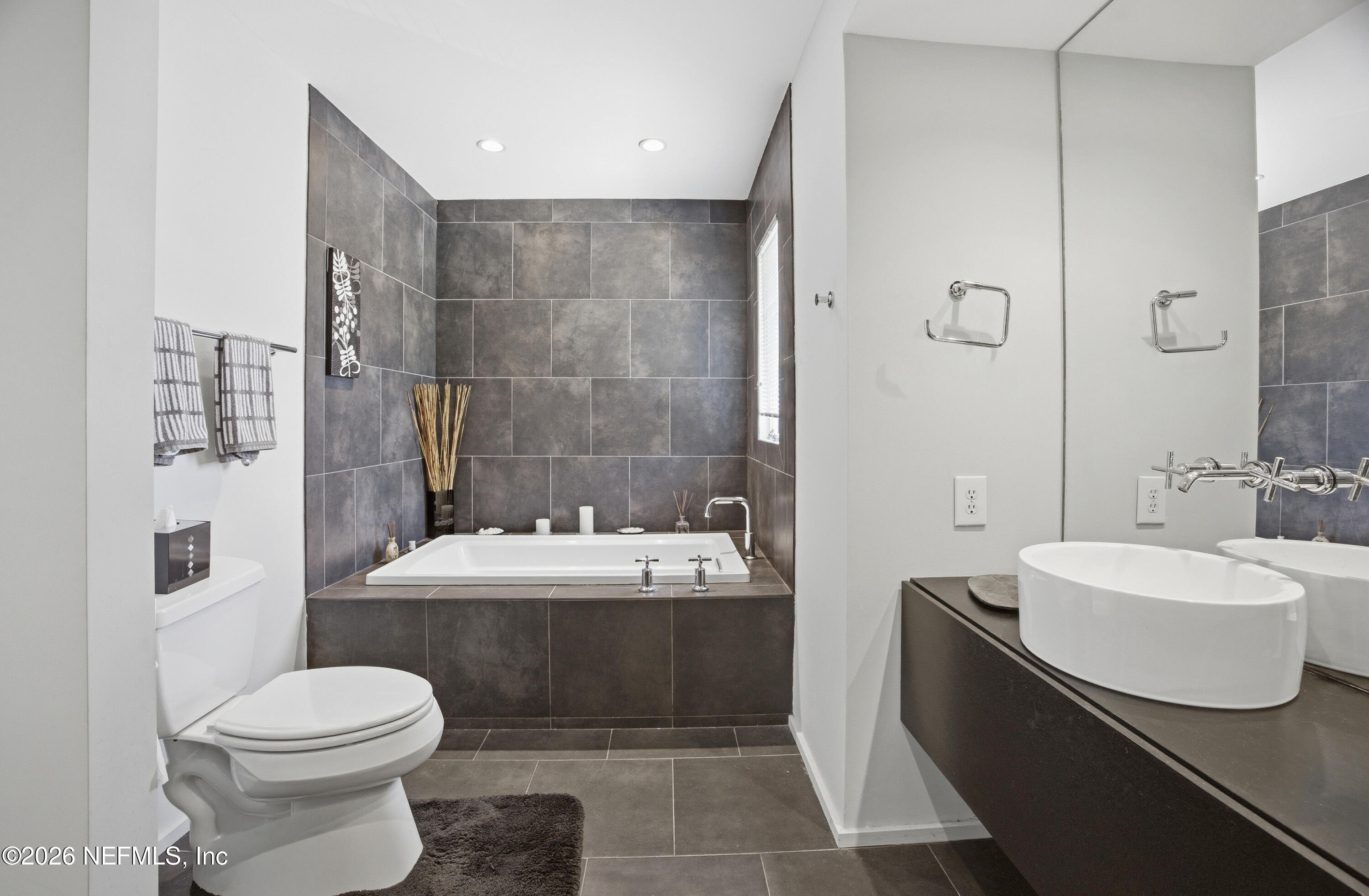 94 Players Club Villas Road Ponte Vedra Beach, FL 32082 - Photo 11 of 25 a bathroom with a sink toilet and shower