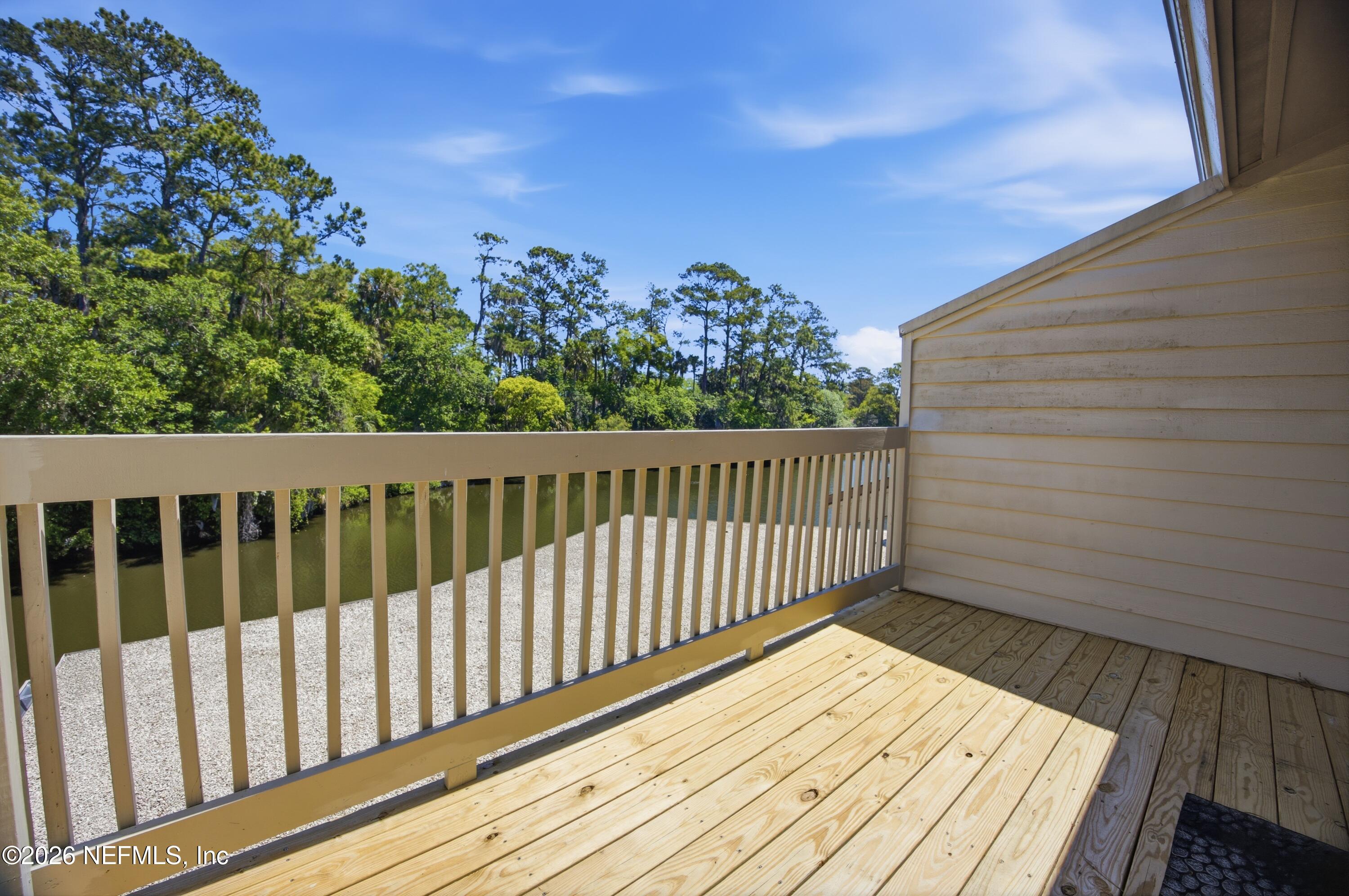 94 Players Club Villas Road Ponte Vedra Beach, FL 32082 - Photo 12 of 25 a view of a wooden fence