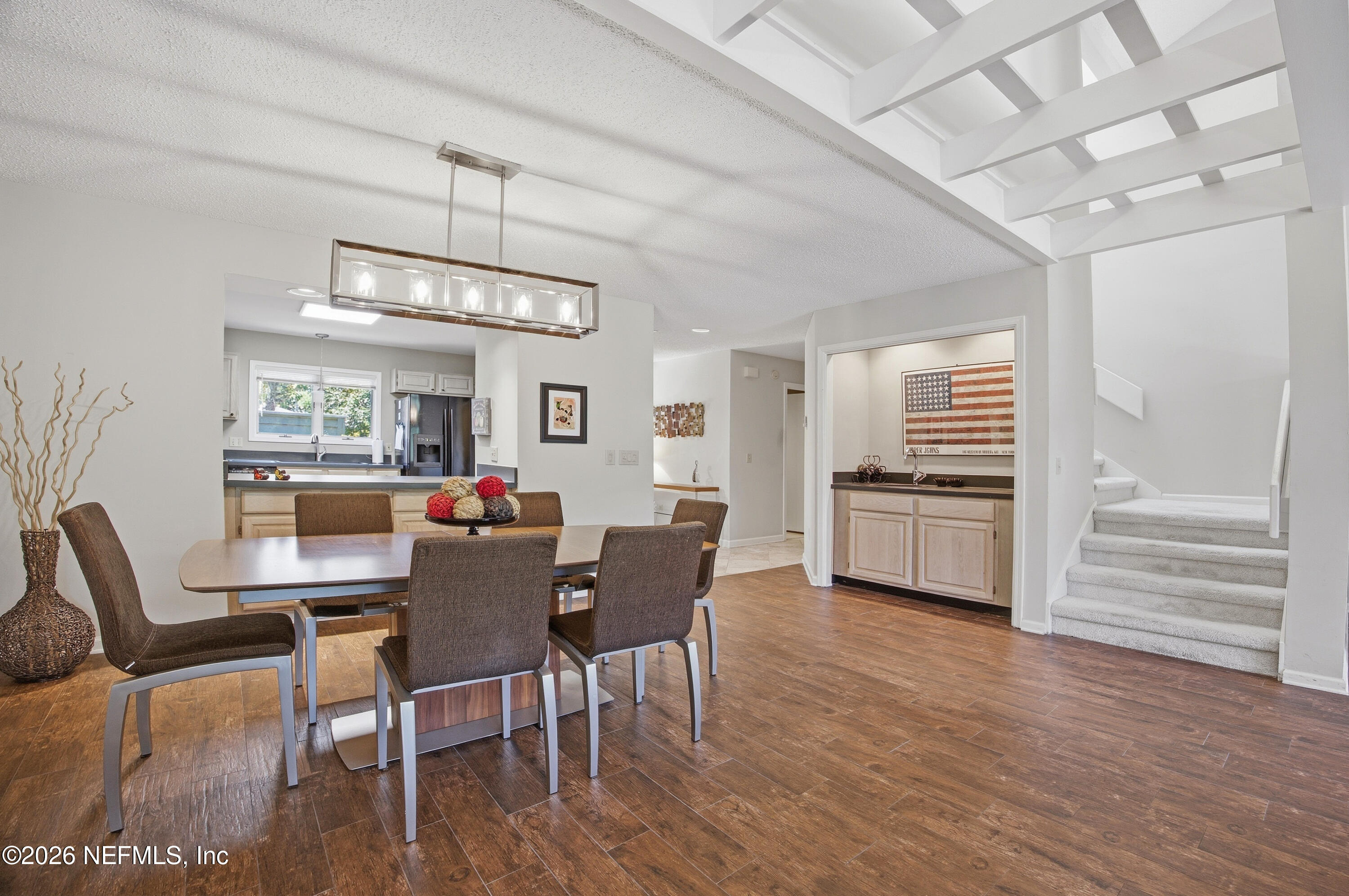 94 Players Club Villas Road Ponte Vedra Beach, FL 32082 - Photo 14 of 25 a view of a dining room with furniture window and wooden floor