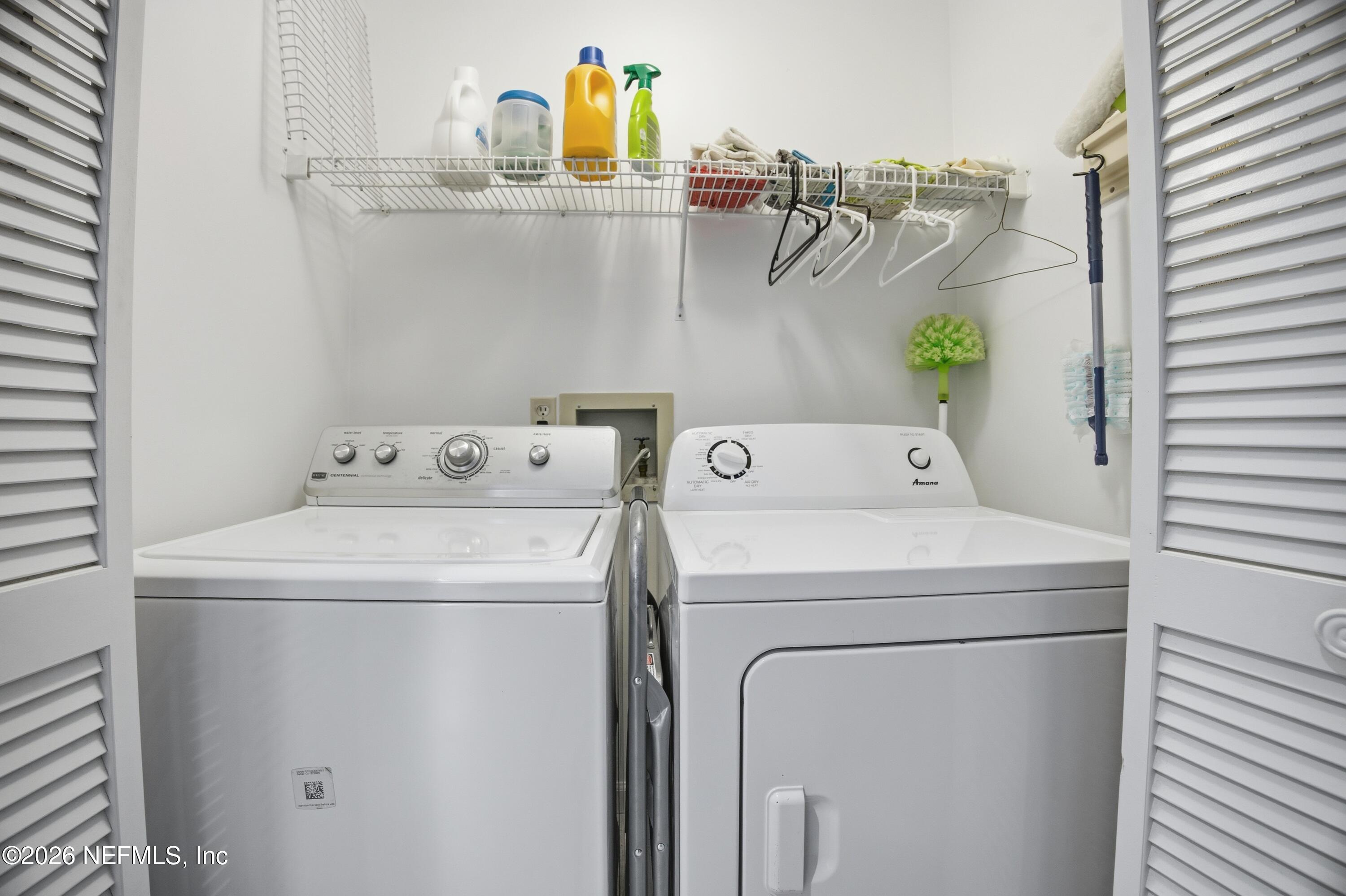94 Players Club Villas Road Ponte Vedra Beach, FL 32082 - Photo 20 of 25 a utility room with dryer and washer