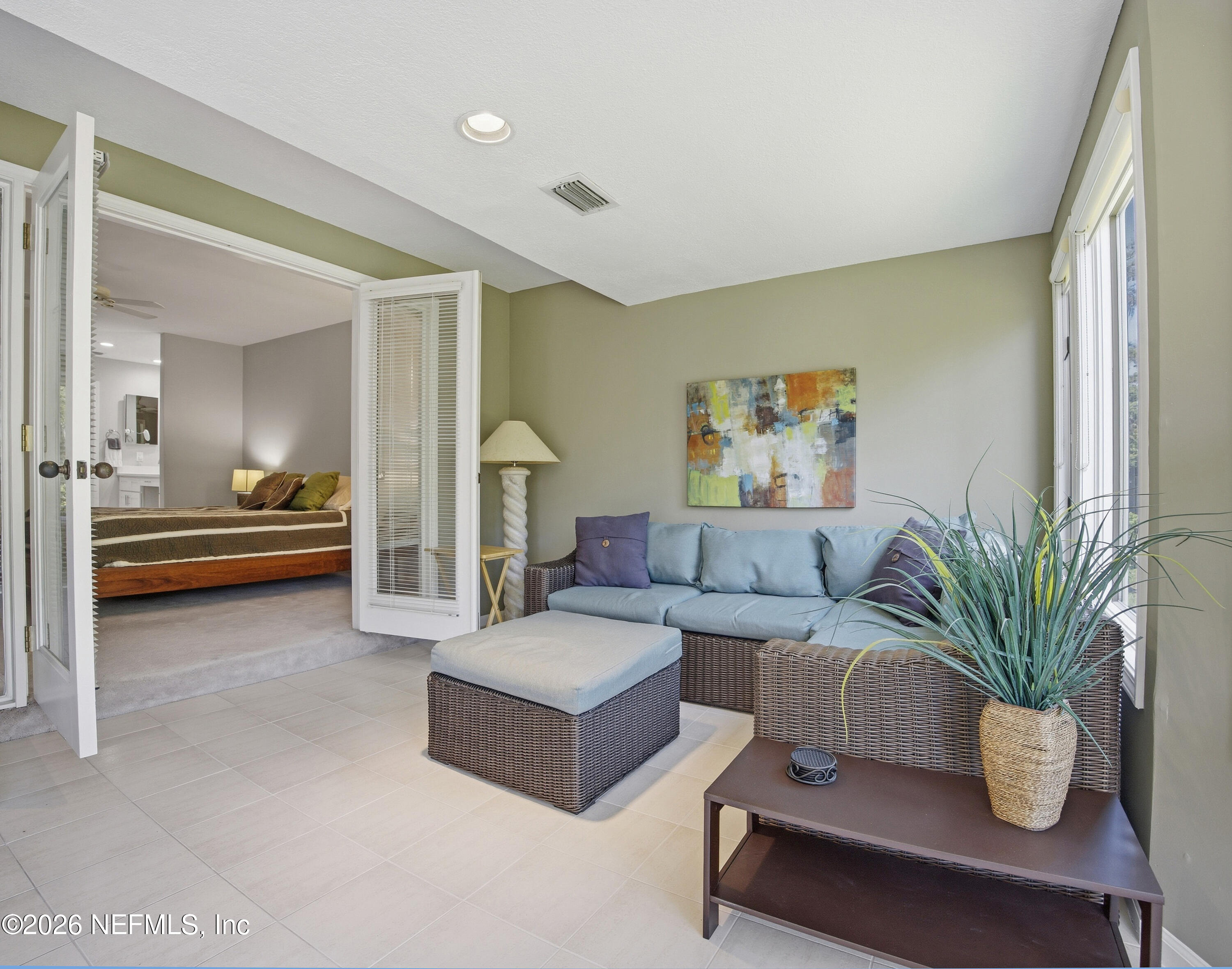 94 Players Club Villas Road Ponte Vedra Beach, FL 32082 - Photo 8 of 25 a living room with furniture and a potted plant