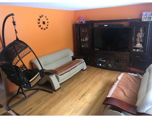 552 Burts Pit Road Northampton, MA 01062 - Photo 3 of 19 a living room with furniture and a flat screen tv