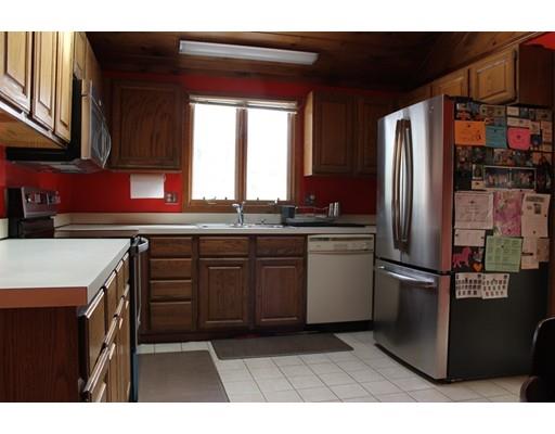 552 Burts Pit Road Northampton, MA 01062 - Photo 5 of 19 a kitchen with stainless steel appliances granite countertop a refrigerator a sink a stove and dishwasher