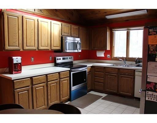 552 Burts Pit Road Northampton, MA 01062 - Photo 6 of 19 a kitchen with stainless steel appliances granite countertop a sink stove and cabinets