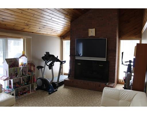 552 Burts Pit Road Northampton, MA 01062 - Photo 7 of 19 a living room with furniture and a flat screen tv