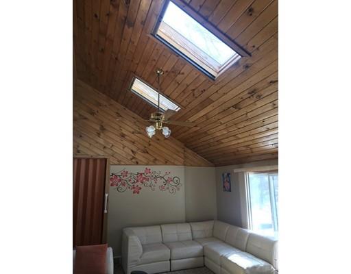 552 Burts Pit Road Northampton, MA 01062 - Photo 8 of 19 a living room with furniture and a ceiling fan
