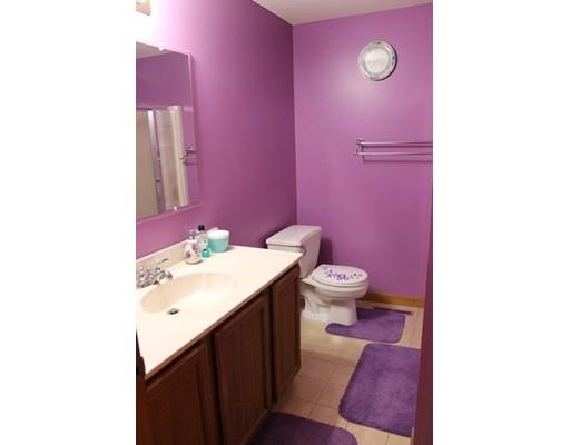 552 Burts Pit Road Northampton, MA 01062 - Photo 10 of 19 a bathroom with a sink a toilet and mirror