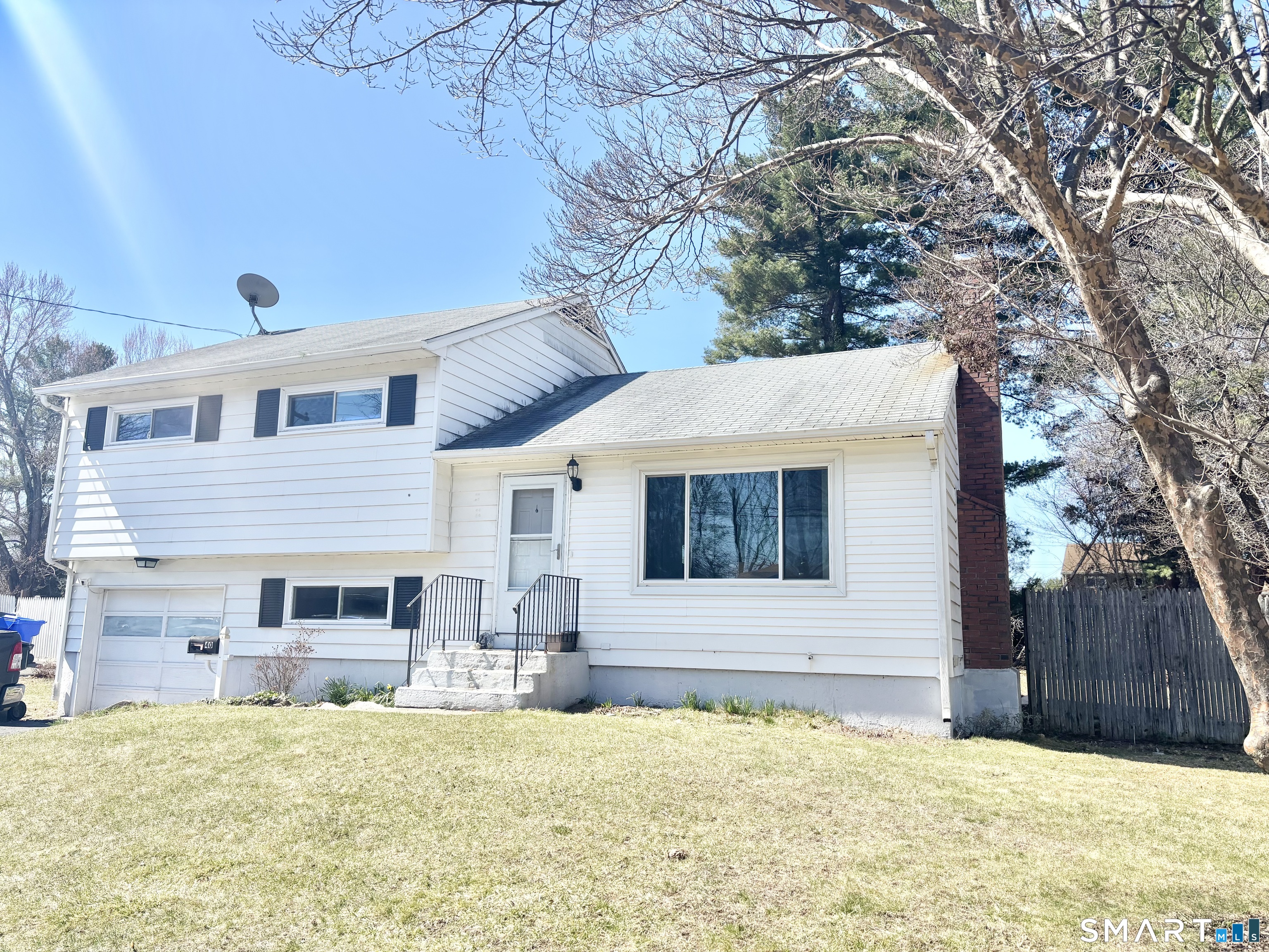 a front view of house with yard