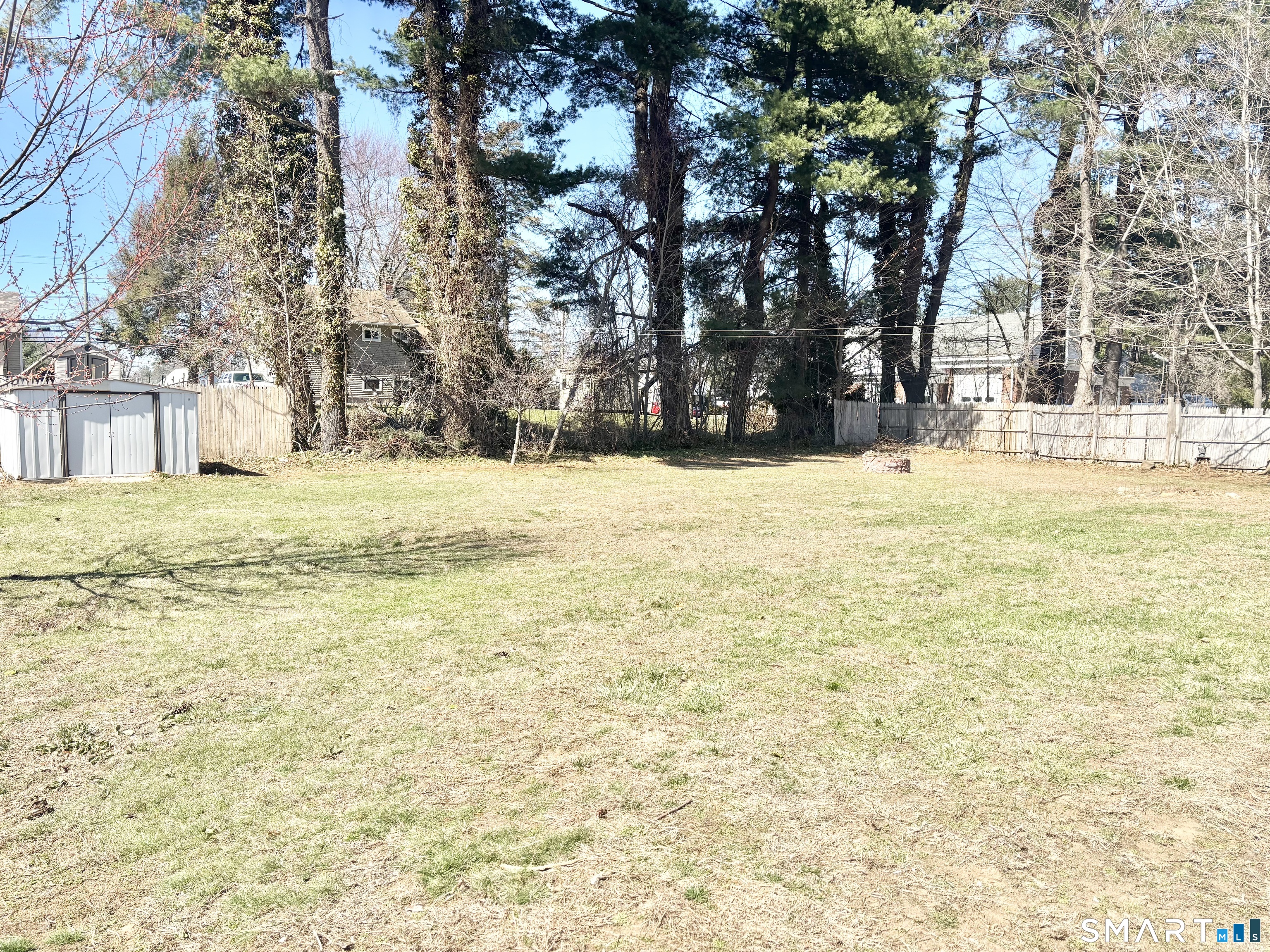 40 Rentschler Street East Hartford, CT 06118 - Photo 14 of 14 a big yard with trees