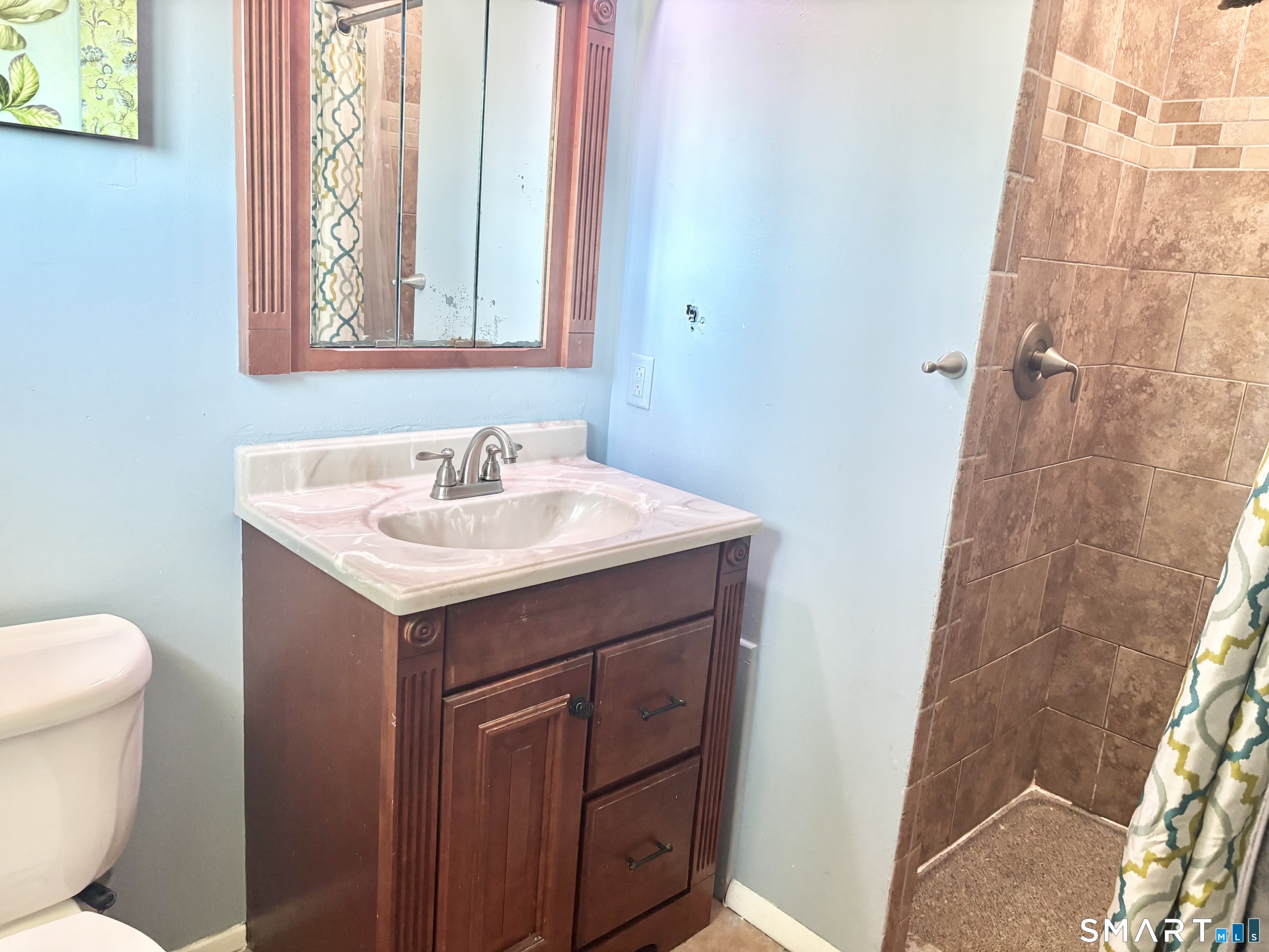 40 Rentschler Street East Hartford, CT 06118 - Photo 6 of 14 a bathroom with a sink and a toilet