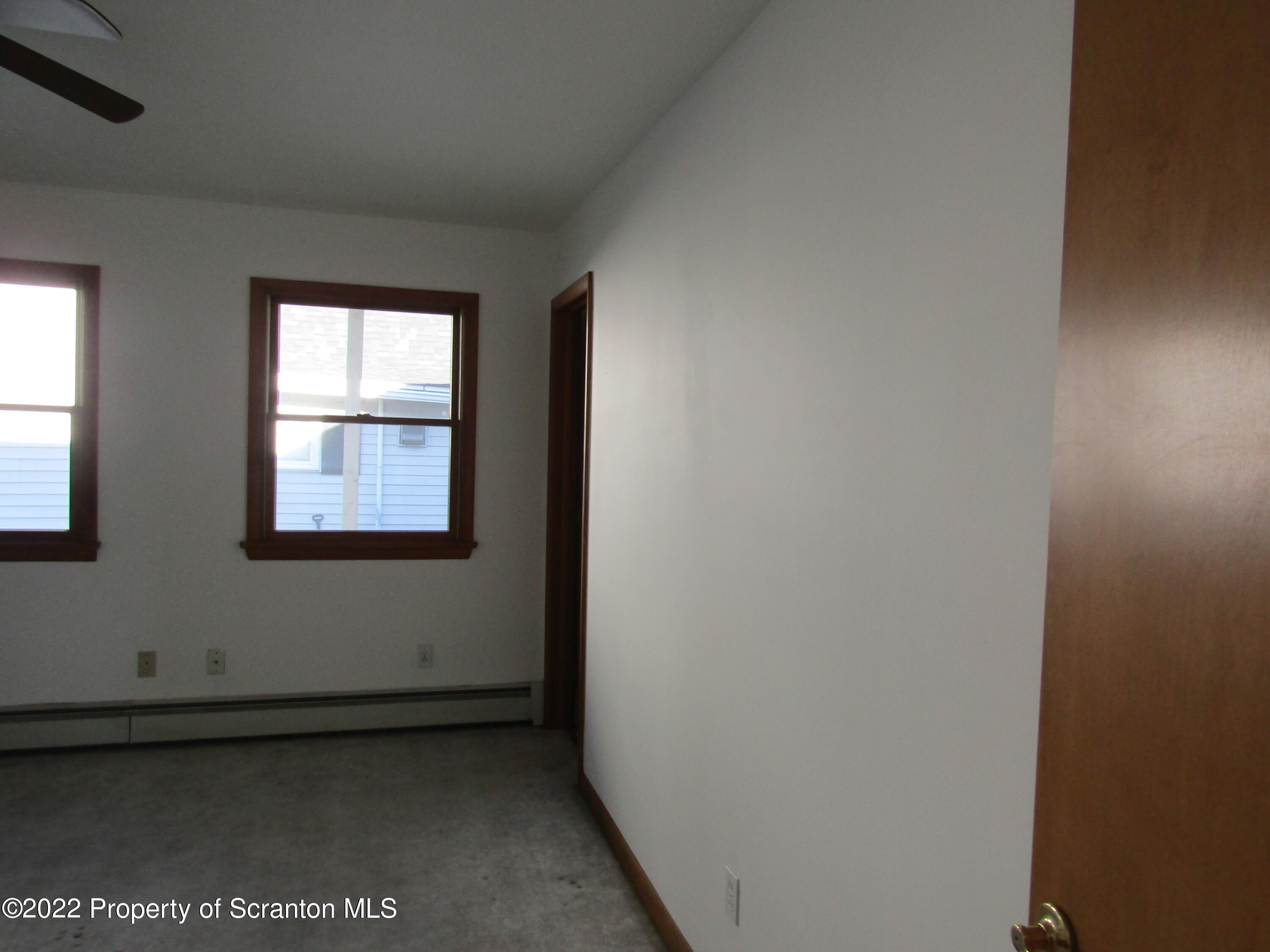 43 Prospect Street Pittston, PA 18640 - Photo 11 of 32 a view of an empty room with a window