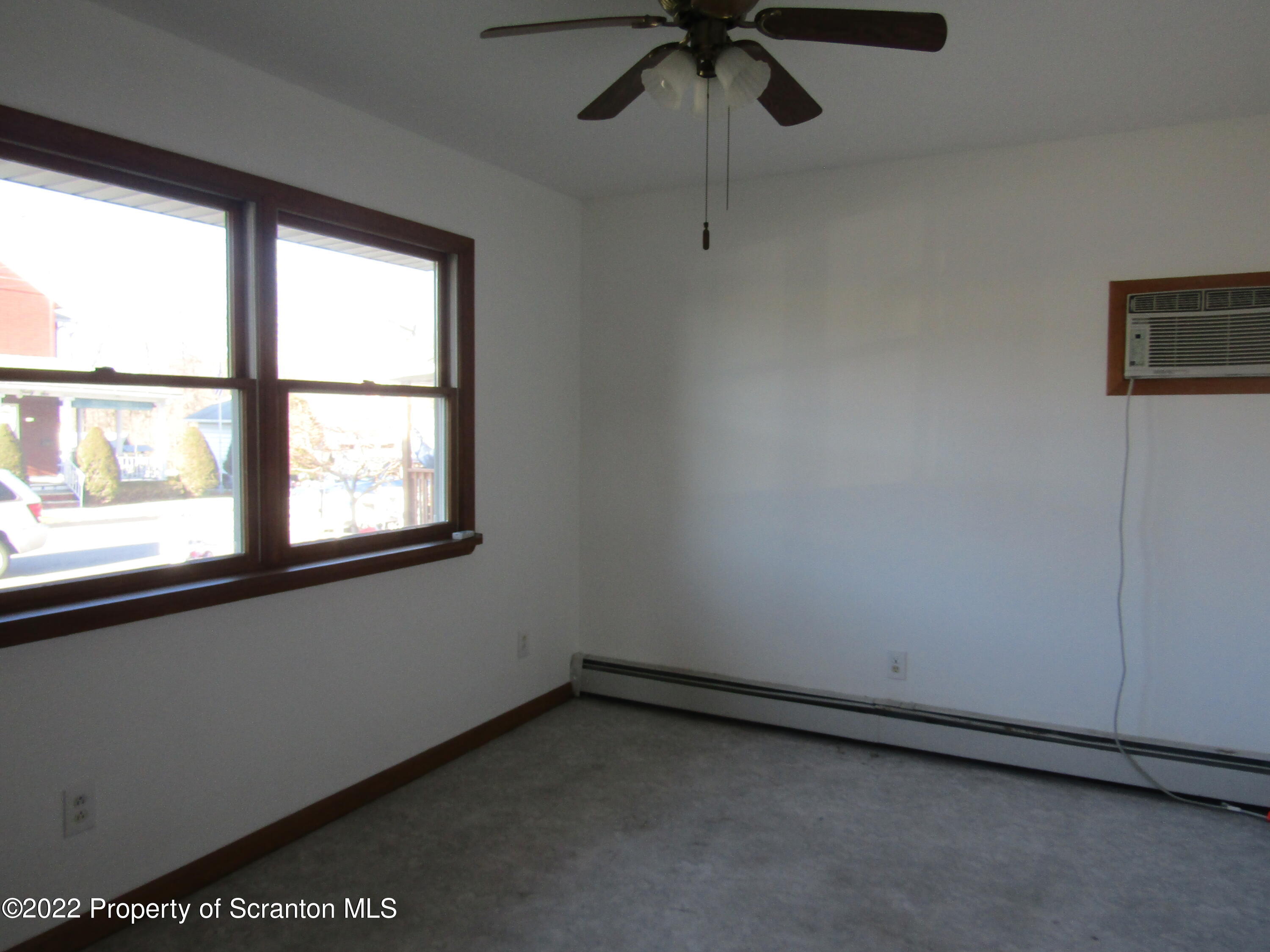 43 Prospect Street Pittston, PA 18640 - Photo 13 of 32 a view of an empty room with a window