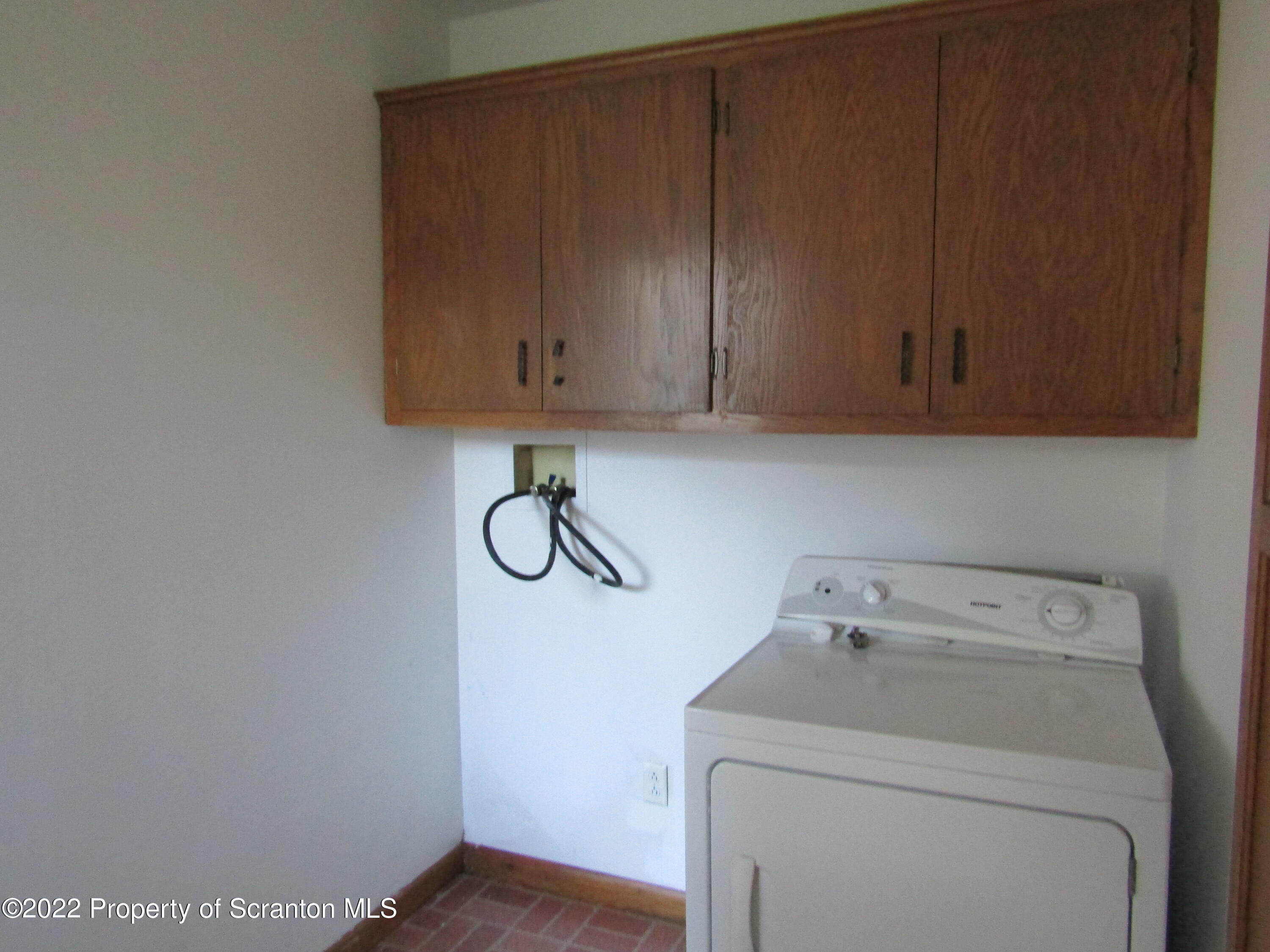 43 Prospect Street Pittston, PA 18640 - Photo 16 of 32 a view of storage and utility room with washer and dryer