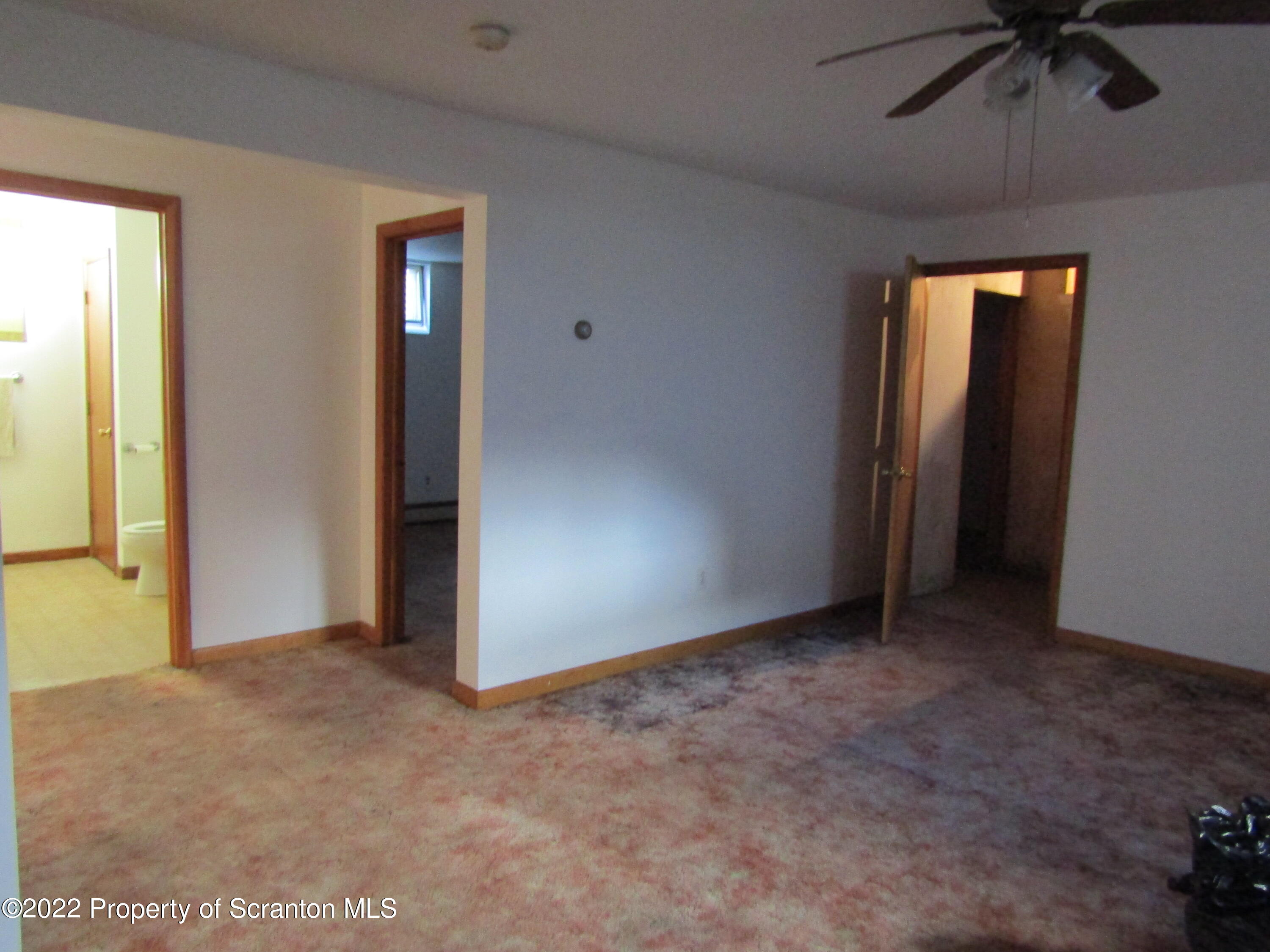 43 Prospect Street Pittston, PA 18640 - Photo 18 of 32 an empty room that has a window in it