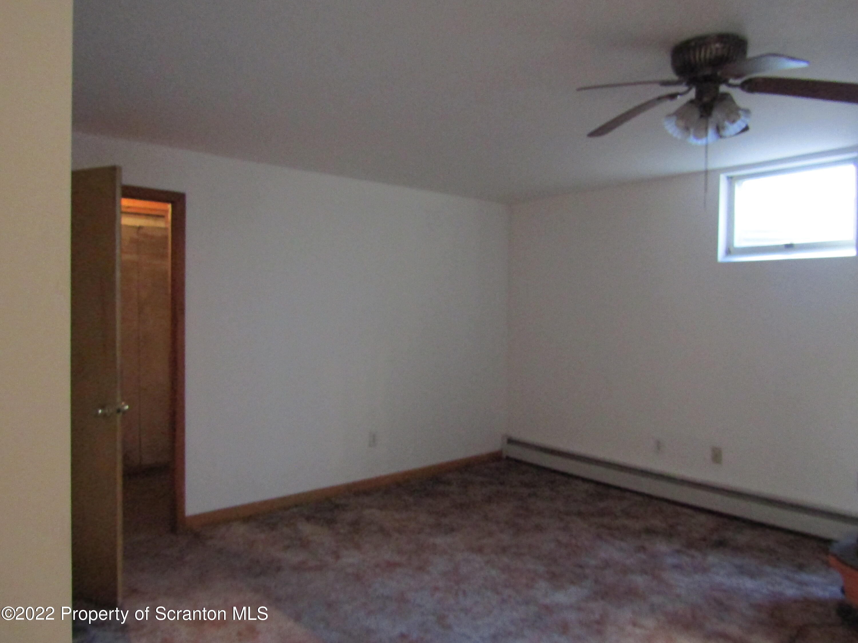 43 Prospect Street Pittston, PA 18640 - Photo 24 of 32 an empty room with a window
