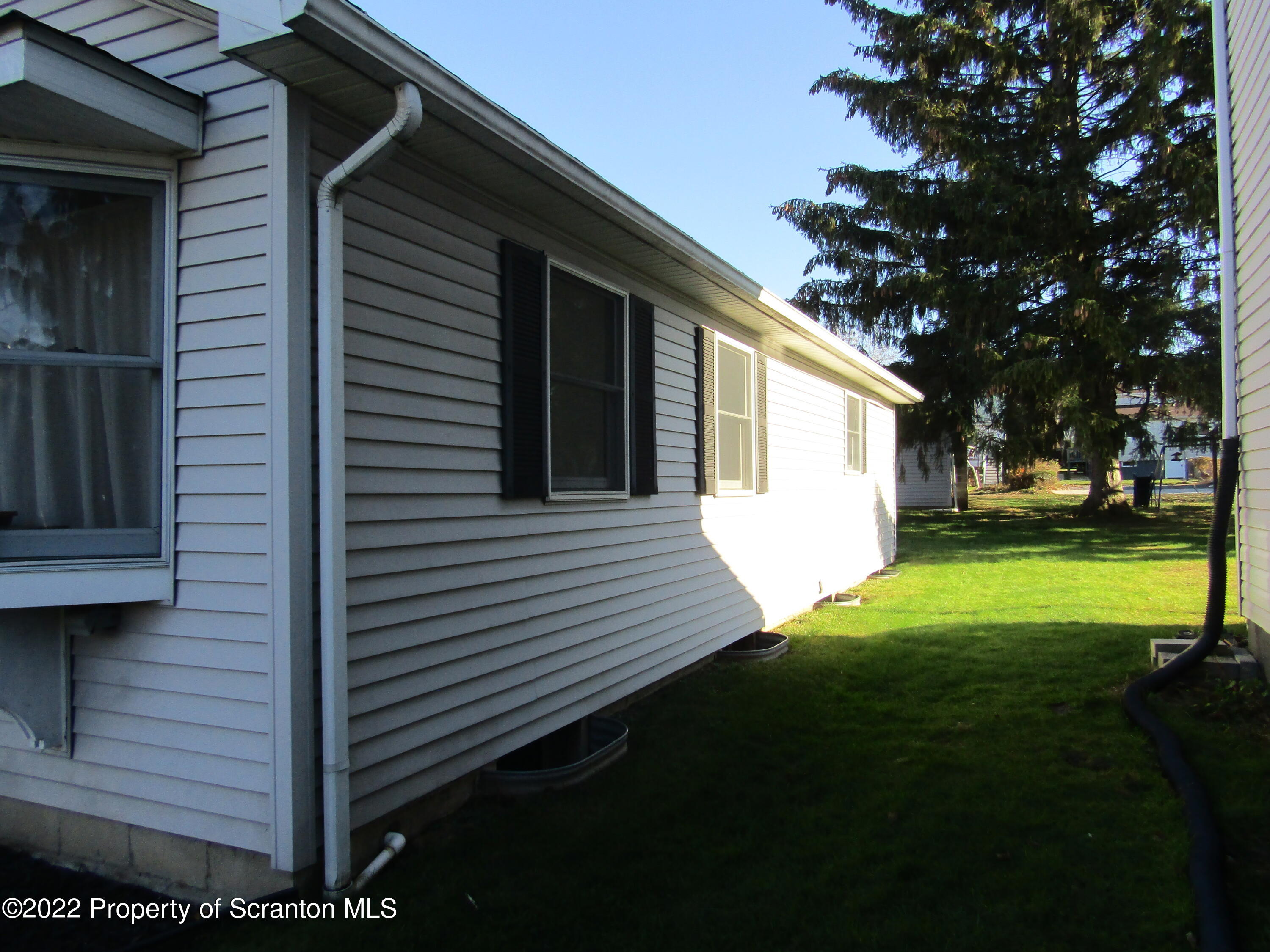 43 Prospect Street Pittston, PA 18640 - Photo 3 of 32 a view of back yard of the house