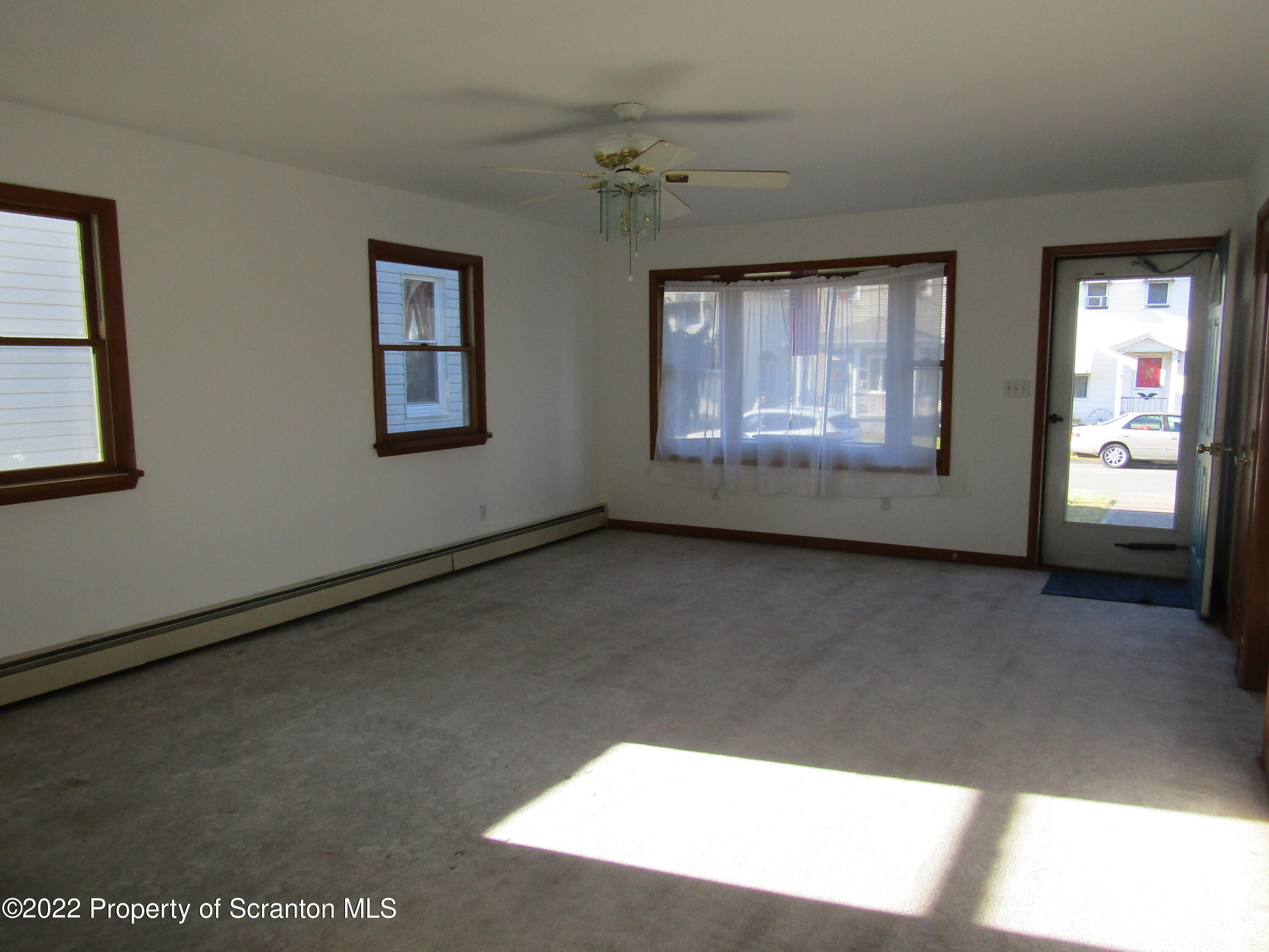 43 Prospect Street Pittston, PA 18640 - Photo 5 of 32 a view of an empty room with a window