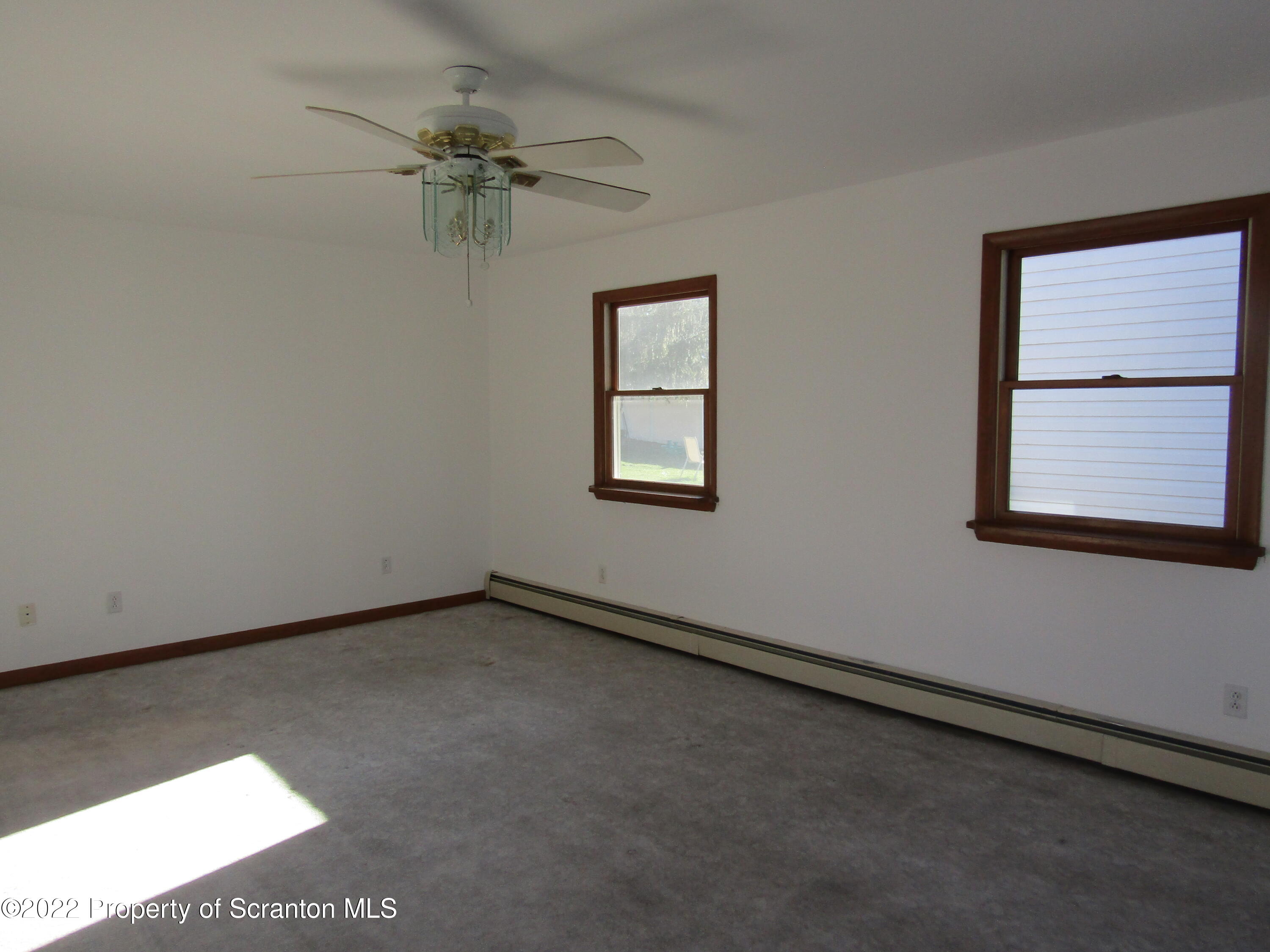 43 Prospect Street Pittston, PA 18640 - Photo 6 of 32 an empty room with a window