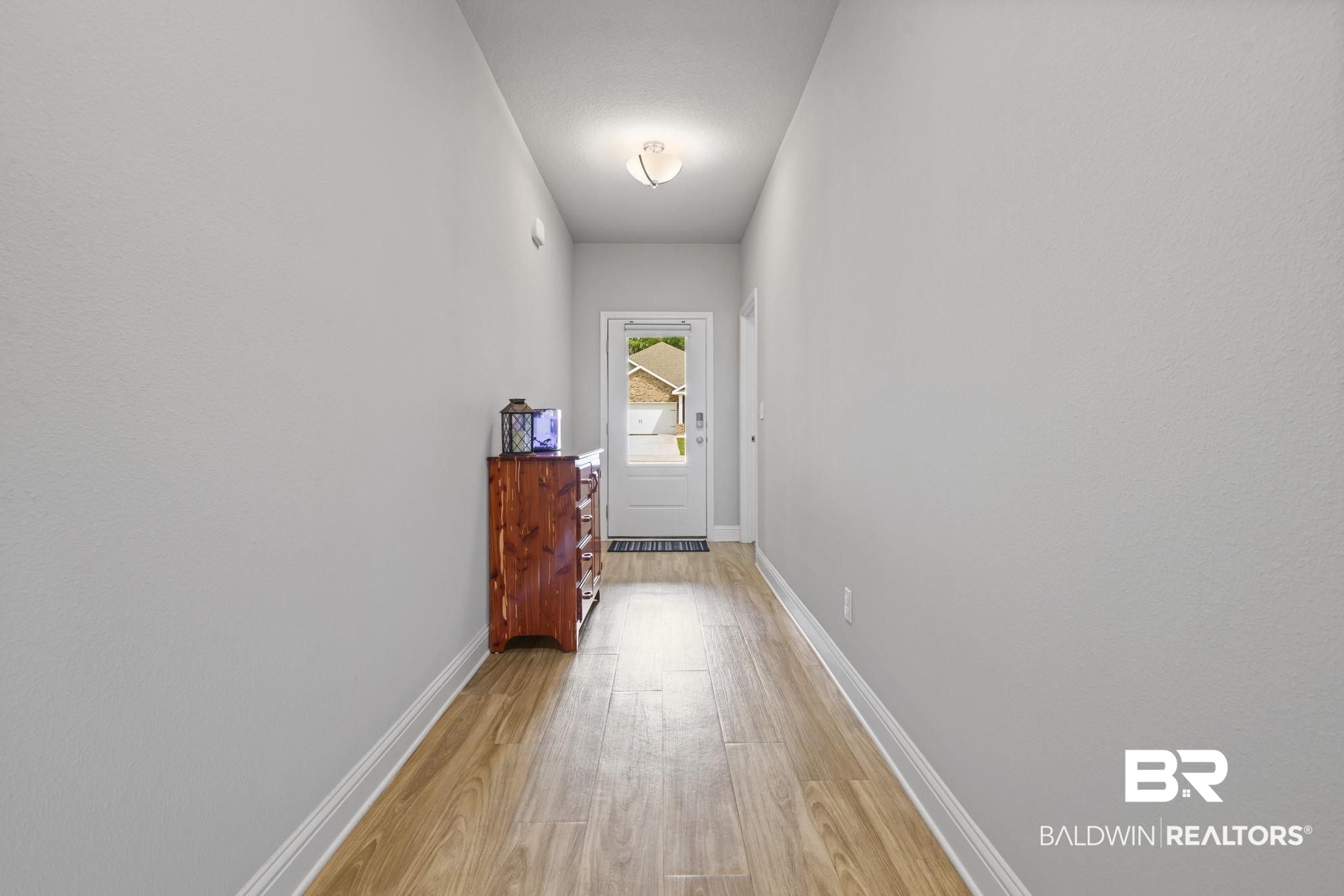 2183 Meadowview Loop Semmes, AL 36575 - Photo 14 of 58 Entryway featuring wood finished floors and baseboards