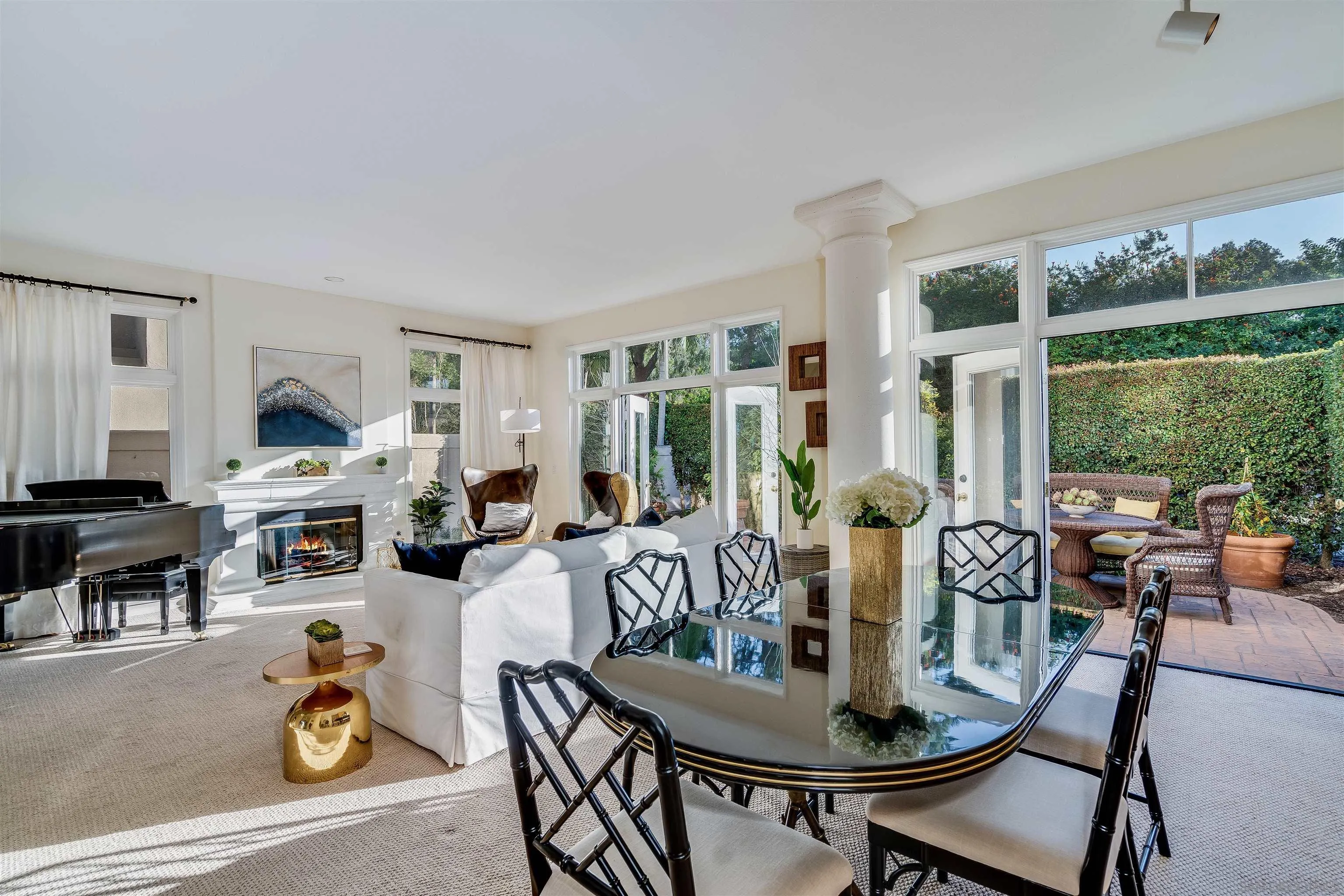 9636 Claiborne Square La Jolla, CA 92037 - Photo 13 of 48 a living room with furniture and a large window
