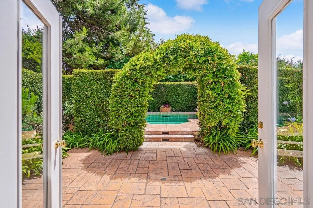 9636 Claiborne Square La Jolla, CA 92037 - Photo 36 of 48 a view of a garden with pathway