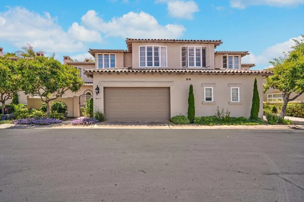 9636 Claiborne Square La Jolla, CA 92037 - Photo 4 of 48 front view of a house with a street
