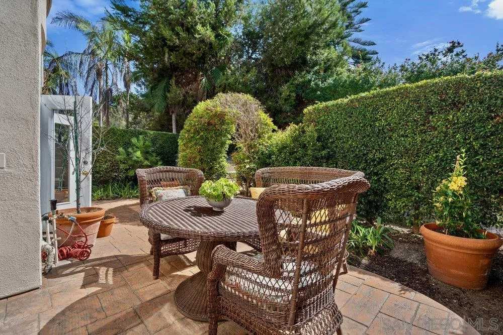 9636 Claiborne Square La Jolla, CA 92037 - Photo 41 of 48 a view of outdoor sitting area with furniture and wooden floor