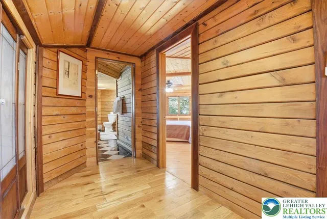 a bath room with a bed and furniture