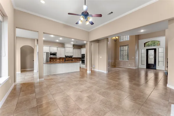 a view of a kitchen with a sink and a stove top oven