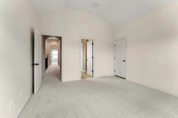 a kitchen with granite countertop a sink stove and cabinets